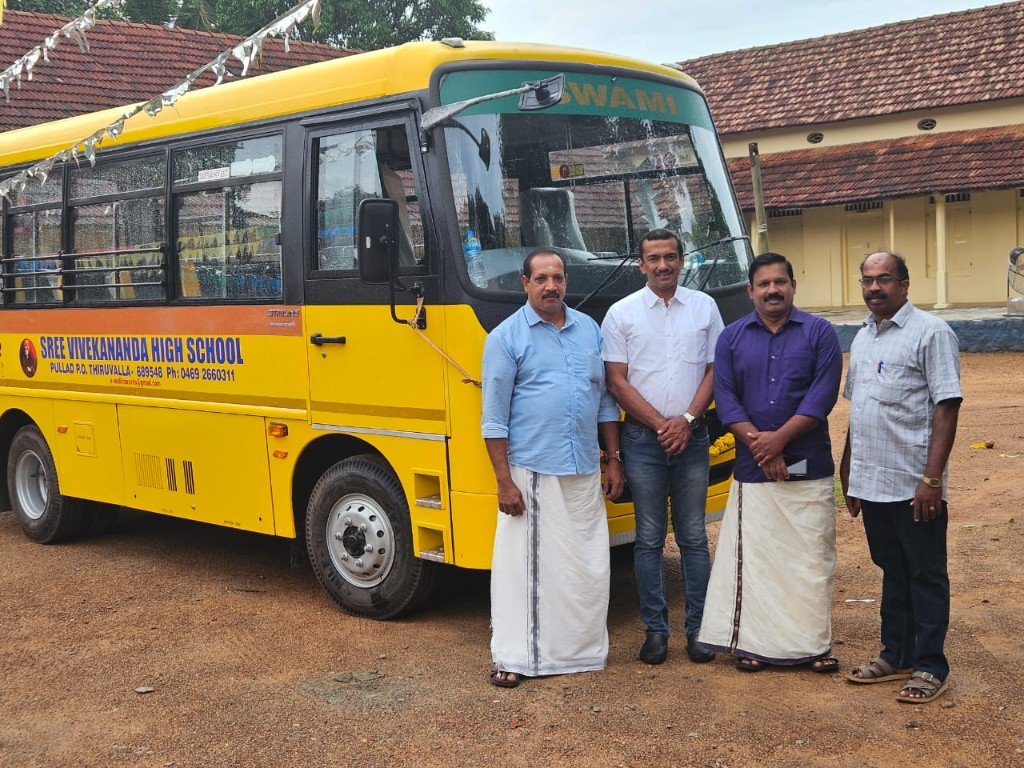 SVHS school bus with staff at campus